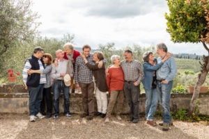 Portrait of loving senior couples, olive trees in background, Florence, Italy Portrait of loving senior couples, olive trees in background, Florence, Italy